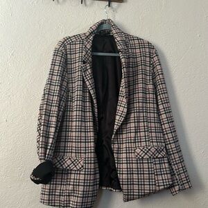 Wore as an oversized blazer goes well w a black turtle neck